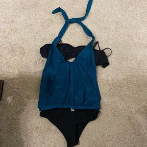 New in packaging 3 piece swim suit, black and teal